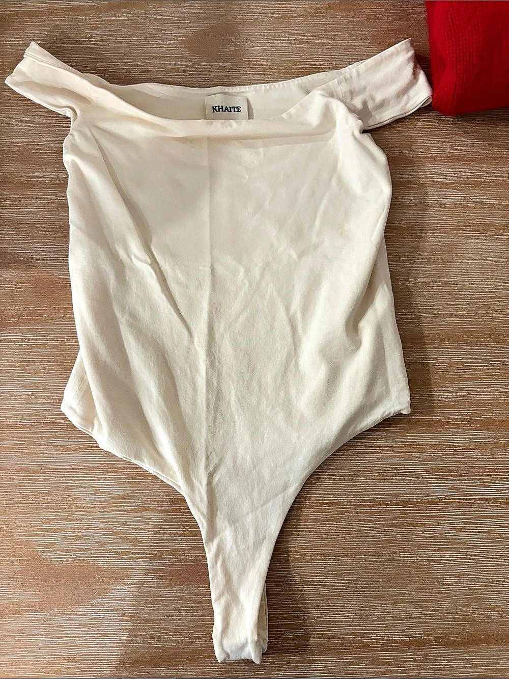 KHAITE Cerise Off-the-Shoulder Bodysuit White